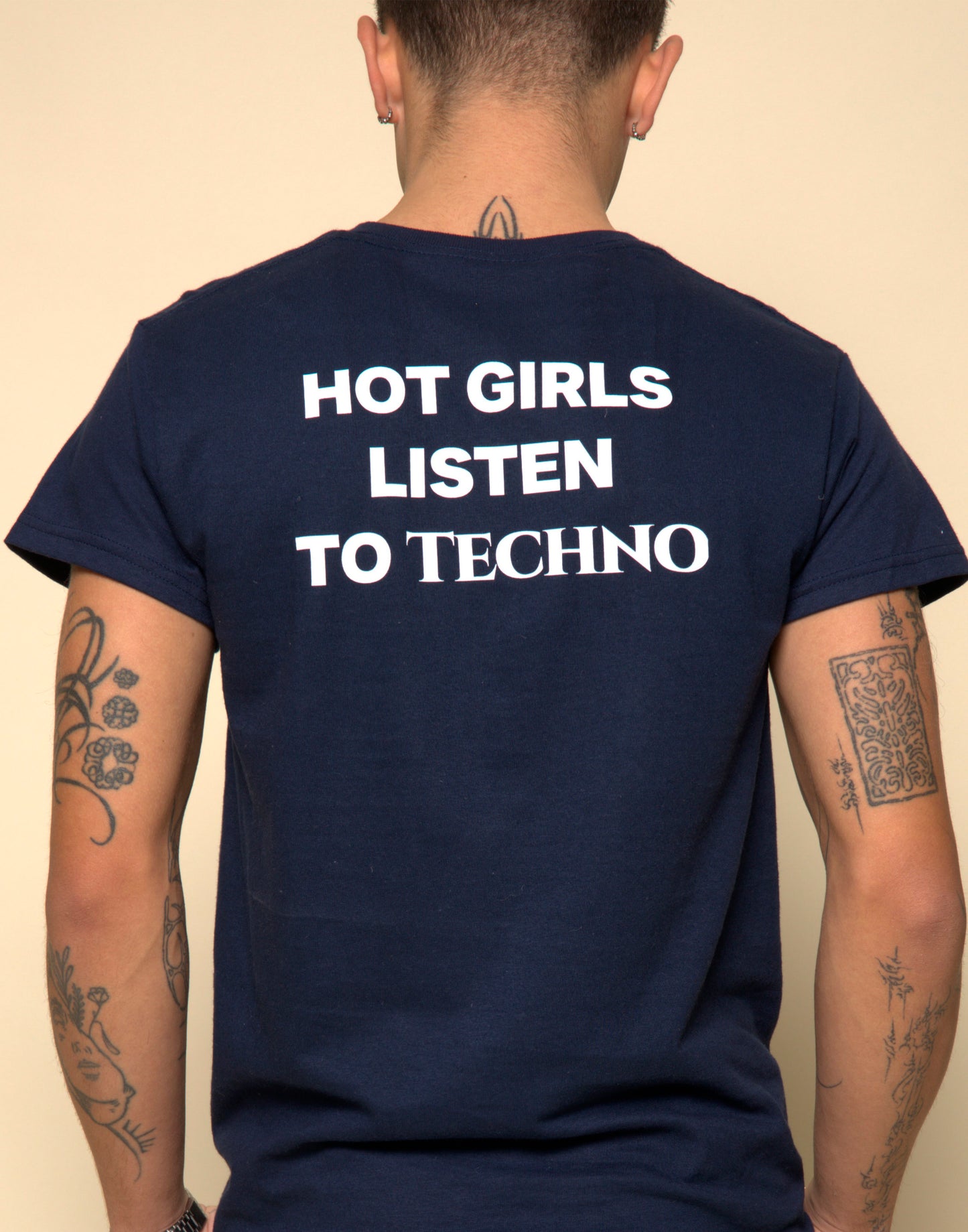 hot girls listen to techno t-shirt navy. By FRASED. Unisex heavy cotton tee with a crew neckline and graphic screen print, made from 100% cotton, featuring a classic fit and tear-away label for comfort.