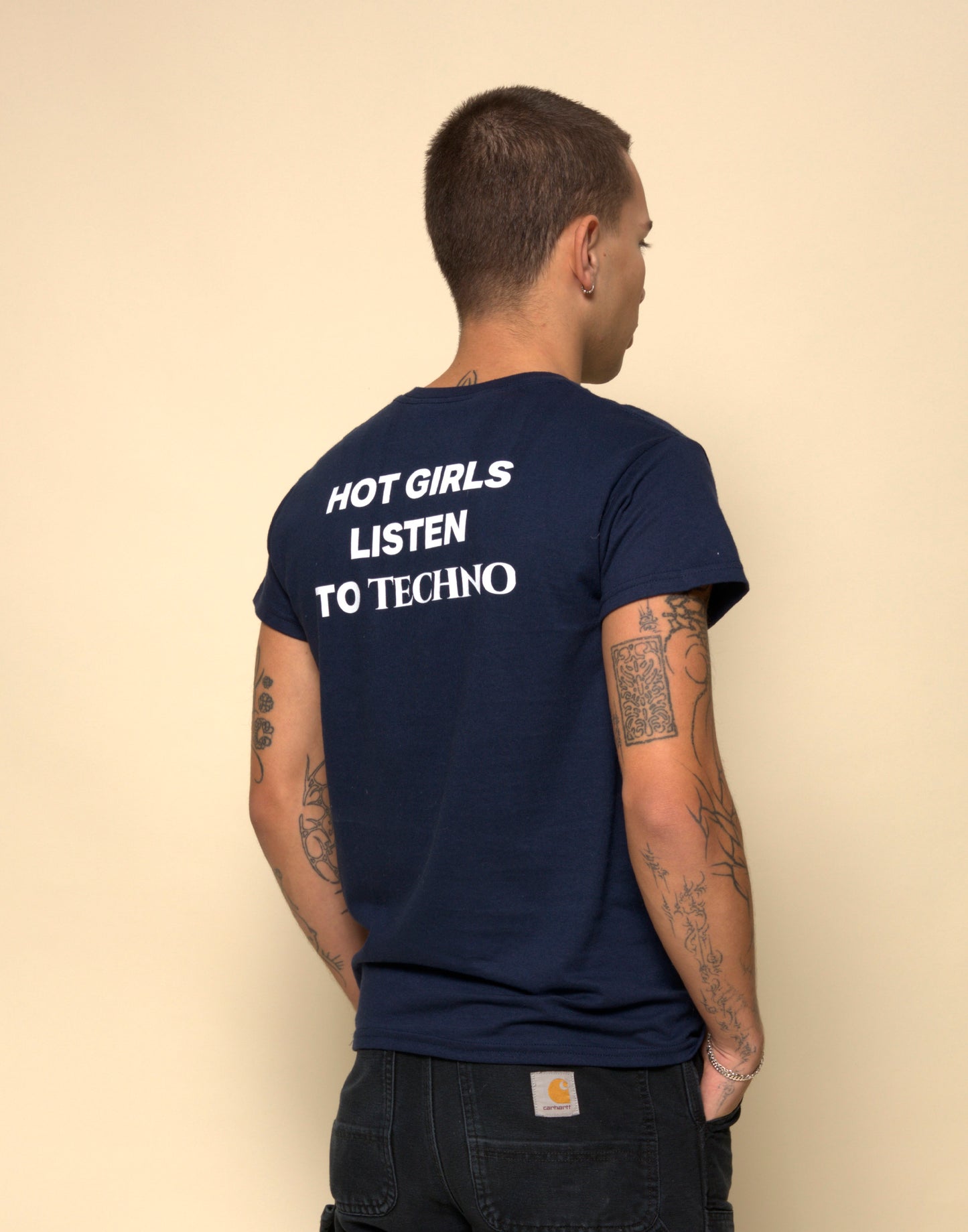 hot girls listen to techno t-shirt navy. By FRASED. Unisex heavy cotton tee with a crew neckline and graphic screen print, made from 100% cotton, featuring a classic fit and tear-away label for comfort.