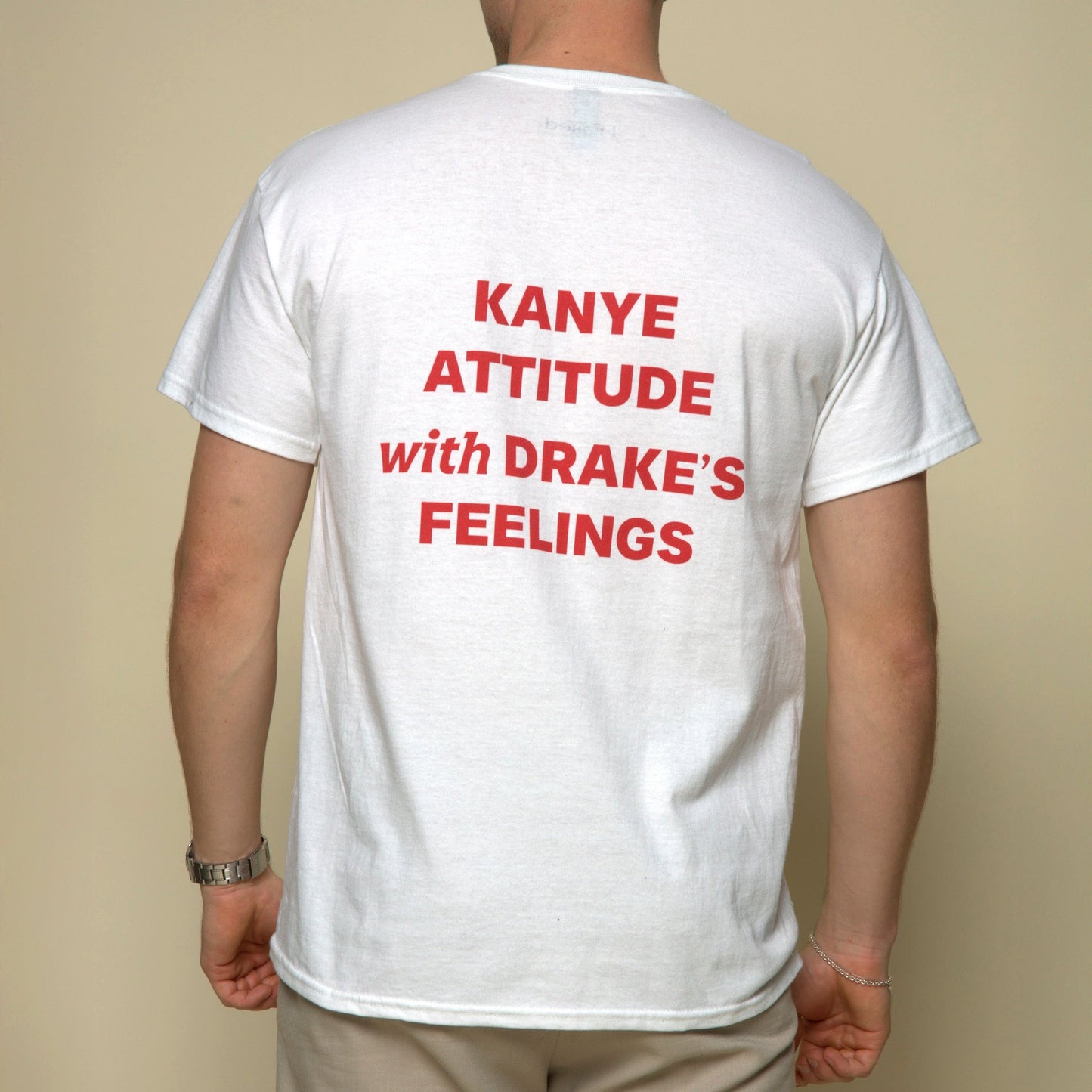 kanye attitude with drakes feelings t-shirt white. By FRASED. Unisex heavy cotton tee with a crew neckline and graphic screen print, made from 100% cotton, featuring a classic fit and tear-away label for comfort.
