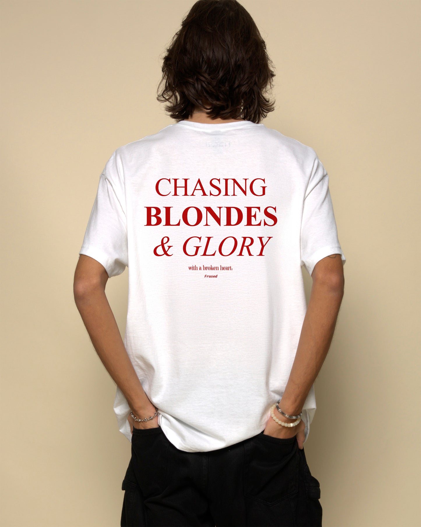 Chasing blondes and glory t-shirt white. By FRASED. Unisex heavy cotton tee with a crew neckline and graphic screen print, made from 100% cotton, featuring a classic fit and tear-away label for comfort.