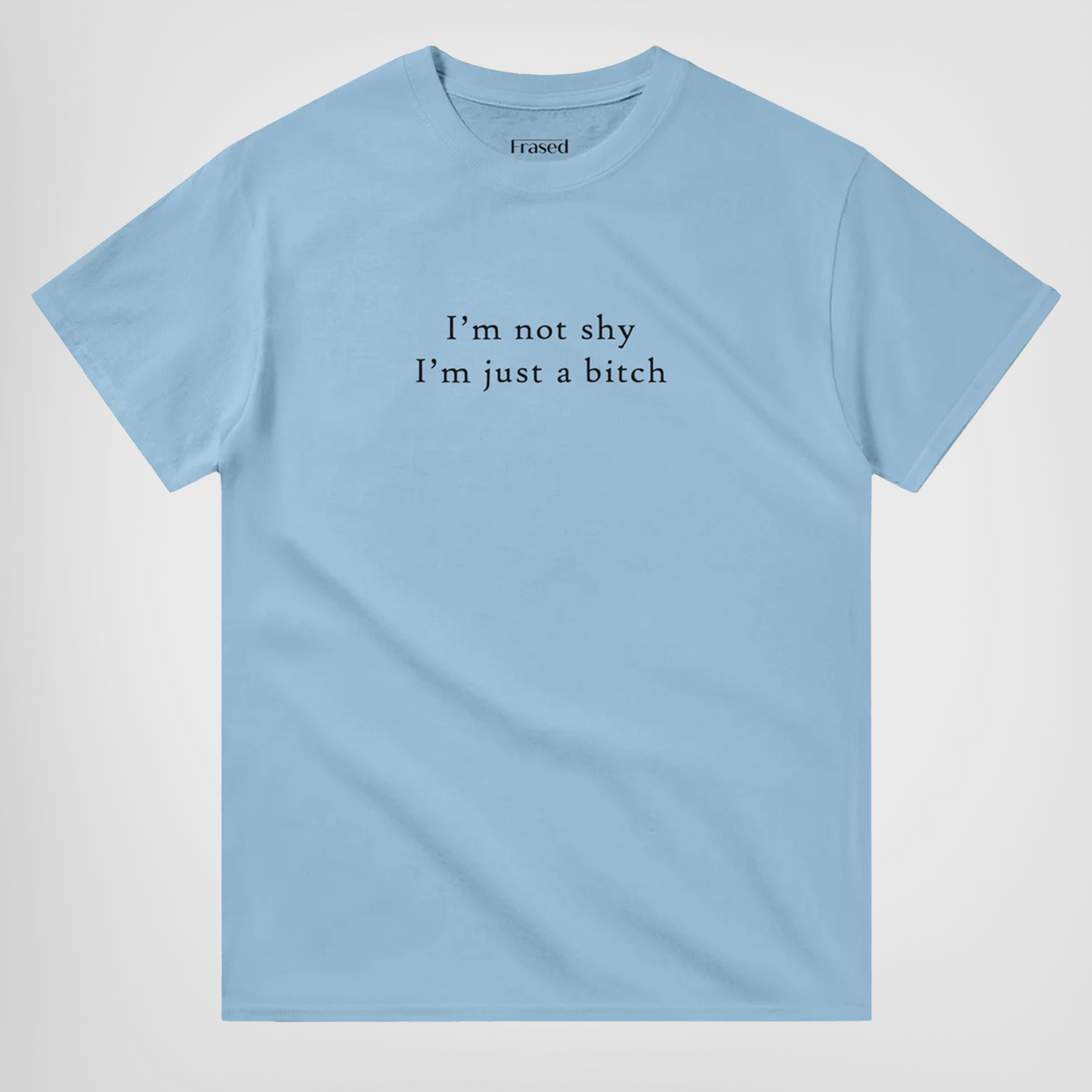 Im not shy im just a bitch t-shirt blue. By FRASED. Unisex heavy cotton tee with a crew neckline and graphic screen print, made from 100% cotton, featuring a classic fit and tear-away label for comfort.