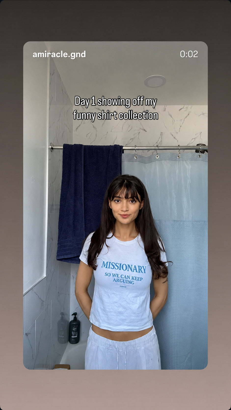 Woman in a white FRASED baby tee with blue “Missionary So We Can Keep Arguing” print.