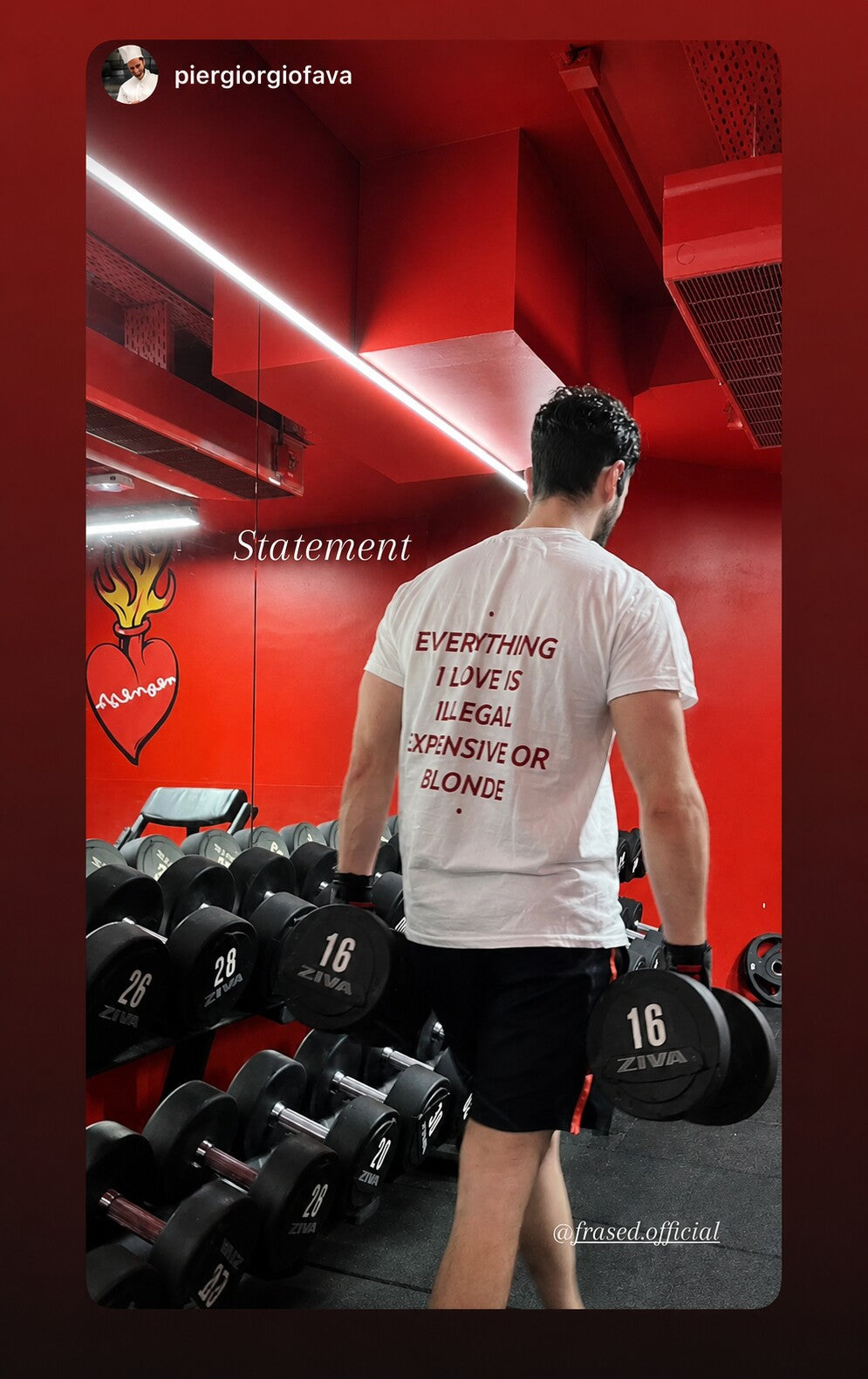 Man lifting dumbbells in a white “EVERYTHING I LOVE IS ILLEGAL EXPENSIVE OR BLONDE” T-shirt.